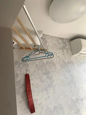 a pair of skis on the floor in a room at Tokyo Guest House 2020 in Tokyo