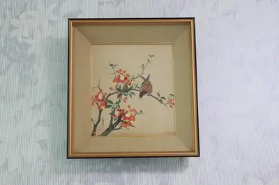 a framed picture of a butterfly on a flower at Tokyo Guest House 2020 in Tokyo