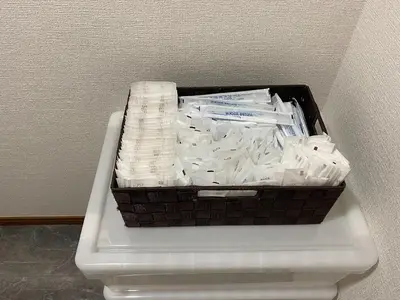a basket of toilet paper sitting on top of a shelf at ONE HOUSE SHINKOIWA - Vacation STAY 26055v in Tokyo