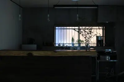 a kitchen with a counter with a window and a sink at \u3077\u3075\u304b\u4e80\u6238 in Tokyo