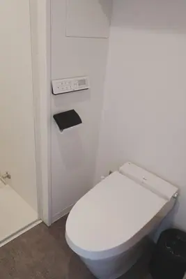 a bathroom with a white toilet in a room at ICHIYU HOTEL ASAKUSA in Tokyo