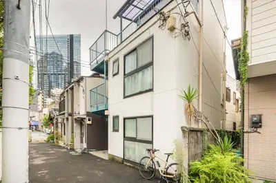 a bike parked on the side of a building at PAPA301 in Tokyo