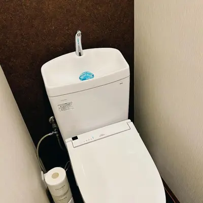a small bathroom with a white toilet in a room at AYA Hotel in Tokyo