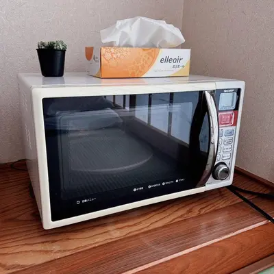 a microwave with a box on top of it at Shiki no Sai Asakusa in Tokyo
