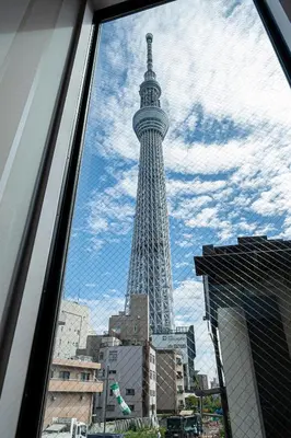 a view of the eiffel tower from a window at La Krasse Skytree - Vacation STAY 12839 in Tokyo