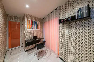 a room with a desk on a wall at La Krasse Skytree - Vacation STAY 12839 in Tokyo