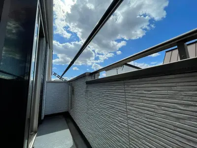 a view from the balcony of a building with a fence at Senjyu House in Tokyo