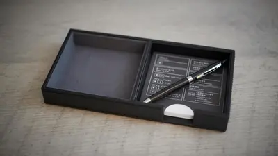 a pen sitting inside of a black box at JR East Hotel Mets Premier Tokyo Bay Shinkiba in Tokyo