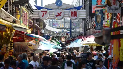 a crowd of people walking through a crowded market at JR-East Hotel Mets Akabane in Tokyo