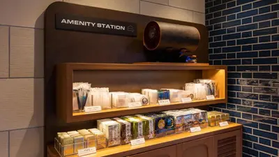a store with a shelf withiazepamaminesaminesaminesktop at JR-East Hotel Mets Akabane in Tokyo