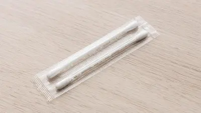 a white plastic object sitting on top of a table at JR-East Hotel Mets Omori in Tokyo