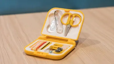 a toy container with scissors and other items on a table at JR-East Hotel Mets Omori in Tokyo