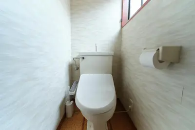 a bathroom with a white toilet in a room at Minami-Shinagawa House by Tranova in Tokyo