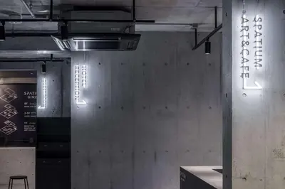 a room with a wall with writing on it at Spatium Ginza Pony in Tokyo