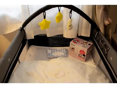 a small bed in a room with at Forest House - Vacation STAY 44322v in Tokyo
