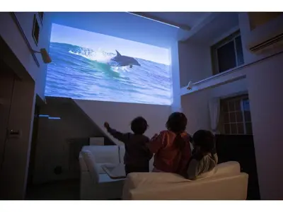 a group of three children watching a dolphin on a screen at Forest House - Vacation STAY 44322v in Tokyo