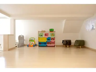 a room with a shelf and some toys in it at Forest House - Vacation STAY 44322v in Tokyo