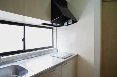 a kitchen with a sink and a window at Designer's Villa in Shinjuku-ku Shin-Okubo sta 6 min walk F in Tokyo