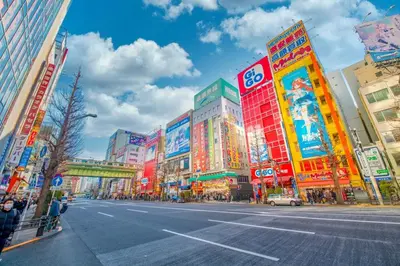 a busy street in a city with many buildings at honeys guest house elevator , wash machine, huge closet space, private bathroom, walk to skytree in 10 minutes in Tokyo