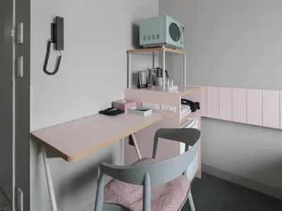a room with a desk and a chair at Vessel Inn Takadanobaba Station in Tokyo