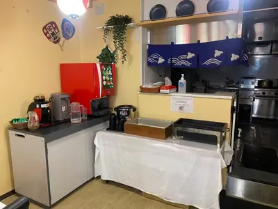 a kitchen with a counter with a counter top with a counter sidx sidx at Ano Hotel Asakusa in Tokyo