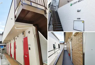a building with red doors and a stairway at Ustay Kitakoiwa in Tokyo