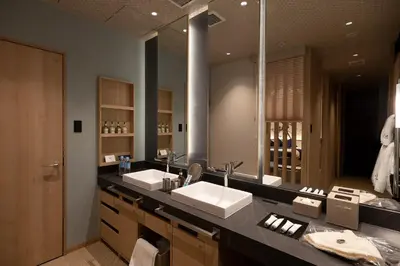 a bathroom with two sinks and a large mirror at HOTEL\u307f\u306a\u3068-MINATO- in Tokyo