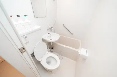 a bathroom with a toilet and a sink at TOKYO ICHIBAN SHINJUKU in Tokyo