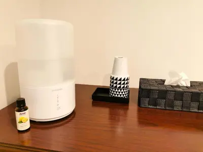 a food processor and a box on a wooden table at Bell house in Tokyo