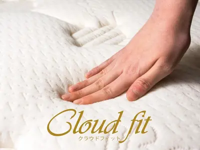 a picture of a hand on a white mattress at APA Hotel Asakusa Kuramae Kita in Tokyo