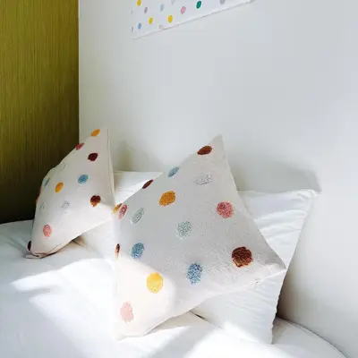 two pillows on a bed with white sheets at \u5c0f\u6625\u65e5\u548c_SOLAMO_\u5fae\u751c\u9928 in Tokyo