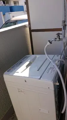 a white machine with a cord on top of it at JING HOUSE渋谷ダブルベッド/新宿・渋谷駅近 in Tokyo