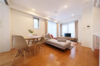 a living room with a couch and a table at Space Roppongi in Tokyo