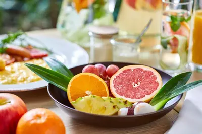 a bowl of fruit sitting on a table at TOKYO EAST SIDE HOTEL KAIE in Tokyo