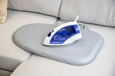 a computer mouse sitting on a cushion on a couch at \u6d45\u8349classy\u30cf\u30a6\u30b9 in Tokyo