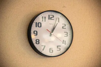 a clock is hanging on the wall at \u6d45\u8349classy\u30cf\u30a6\u30b9 in Tokyo