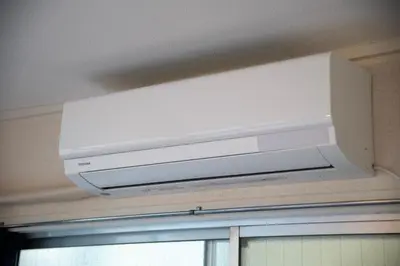 a large white light hanging from a ceiling at \u6d45\u8349classy\u30cf\u30a6\u30b9 in Tokyo
