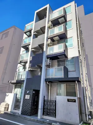 an apartment building with balconies on the side of it at SaffronCasa Asakusabashi by Tranova in Tokyo