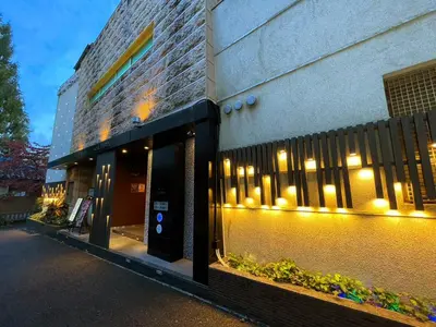 a building with lights on the side of it at Hotel THE ATTA Adult Only in Tokyo
