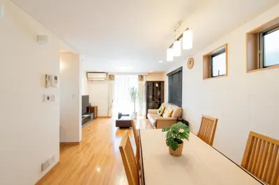 a living room with a table and a couch at Fukuhama - Vacation STAY 13867 in Tokyo