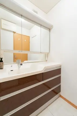 a bathroom with a sink and a mirror at Fukuhama - Vacation STAY 13867 in Tokyo
