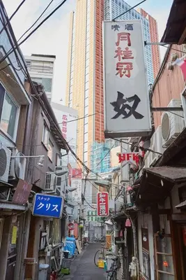 a city street with many signs and buildings at Holiday Places /SHIBUYA 5min by train (Sangenjaya) in Tokyo