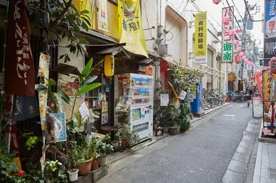 an alley with plants on the side of a building at Holiday Places /SHIBUYA 5min by train (Sangenjaya) in Tokyo