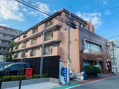 a building on the corner of a street at K&M Heights - Vacation STAY 20628v in Tokyo