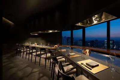a long dining room with long tables and chairs at BELLUSTAR TOKYO, A Pan Pacific Hotel in Tokyo