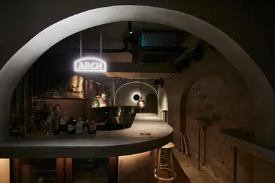 a kitchen with an archway and a counter in a room at Boutique Sauna ARCH in Tokyo