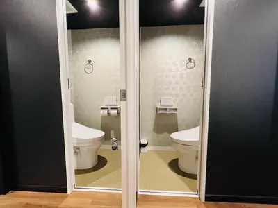 a bathroom with two toilets and two sinks at Asakusa-Smile-SM0141 in Tokyo
