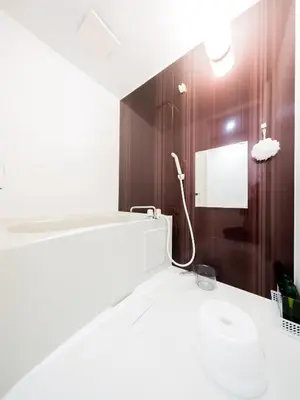 a bathroom with a sink and a mirror at 5min walk to Tokyo Skytree Sta -HANA ASAKUSA- in Tokyo