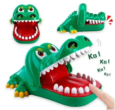 a toy crocodile mouth playset with a persons hand at 5min walk to Tokyo Skytree Sta -HANA ASAKUSA- in Tokyo