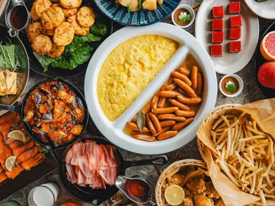 a table filled with different types of food at GINZA HOTEL by GRANBELL in Tokyo